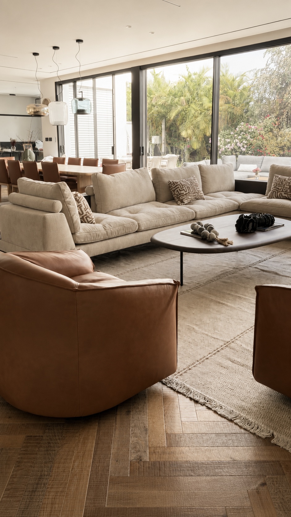 Vine Project — open living and dining with leather swivel chairs