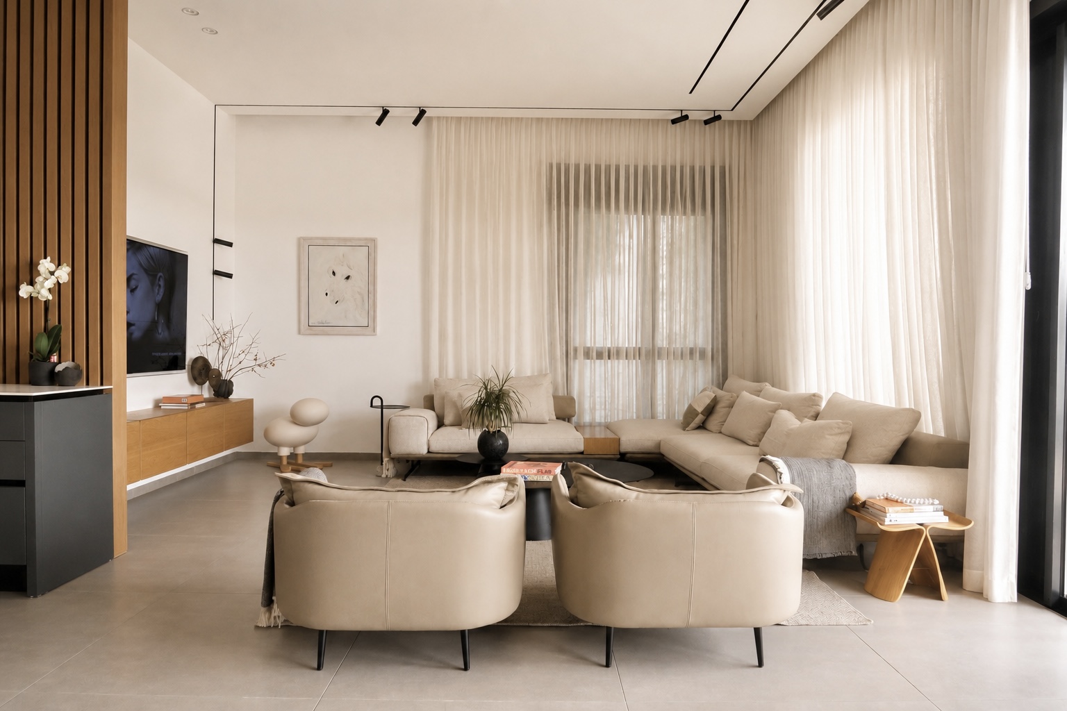 Mota Project — living room with leather swivel chairs