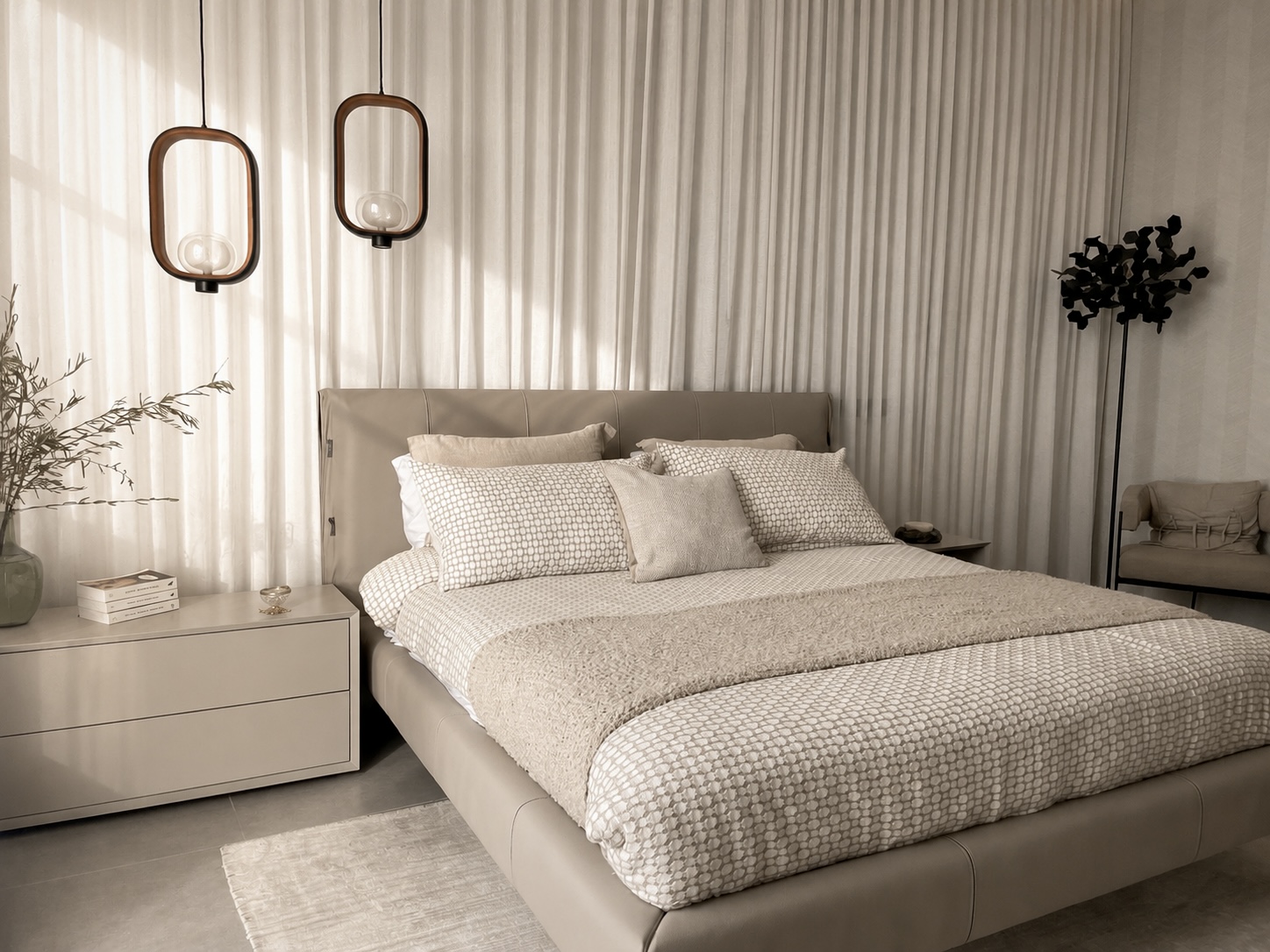 Mota Project — primary bedroom with sheer drapery and pendants