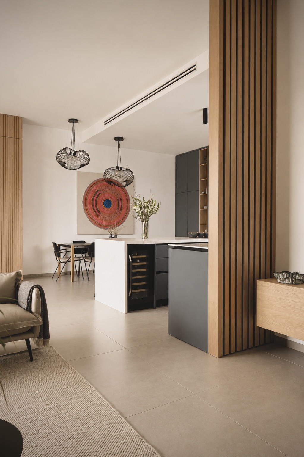 Mota Project — oak slat partition and bar area