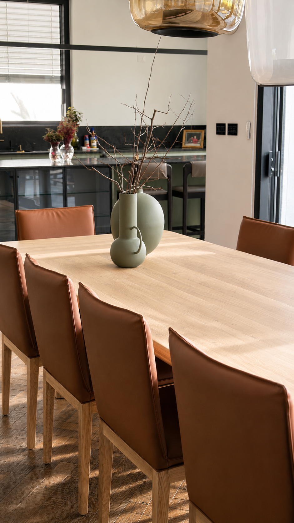 Vine Project — dining table with sculptural sage vase