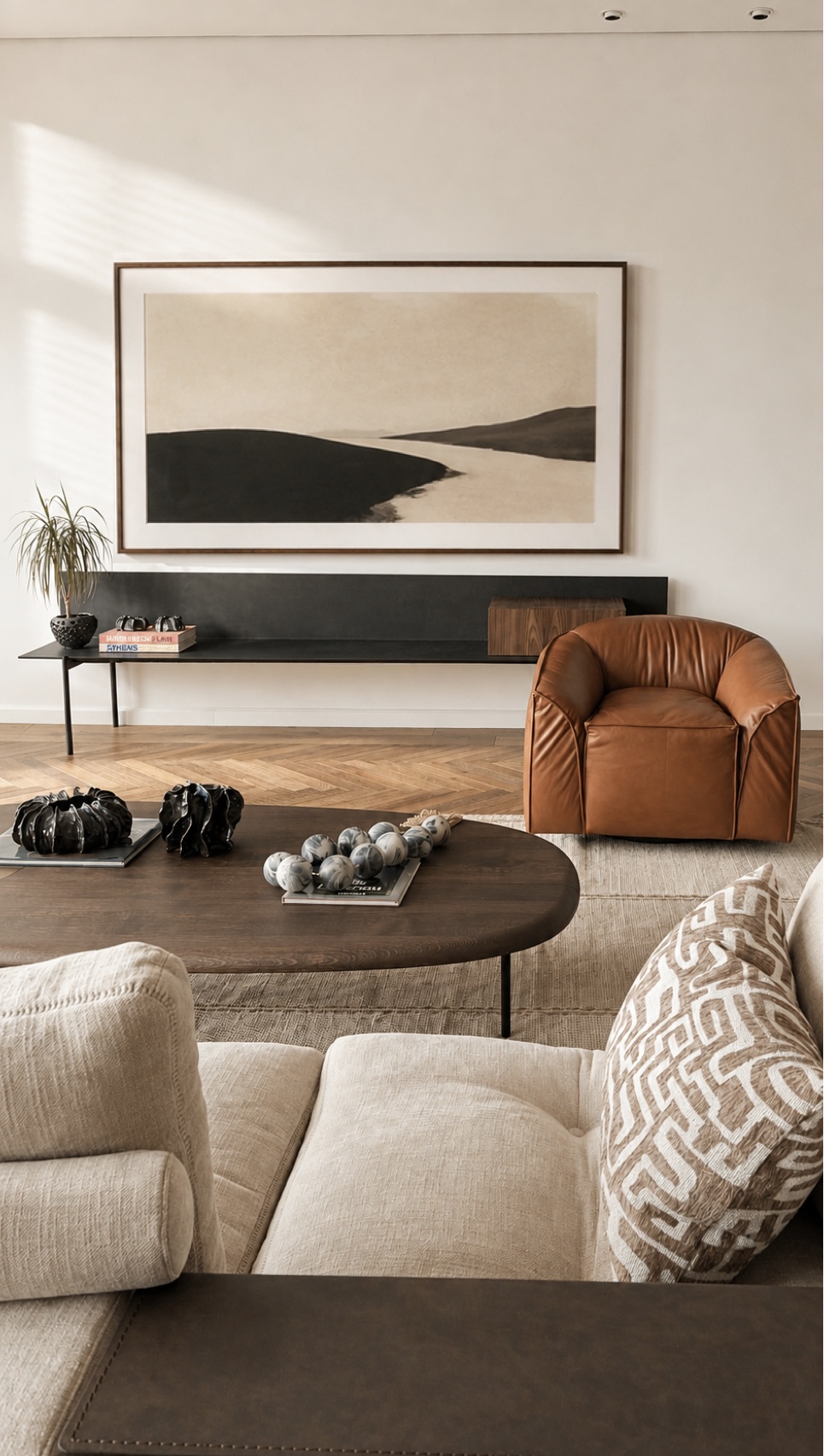 Vine Project — lounge with framed landscape artwork